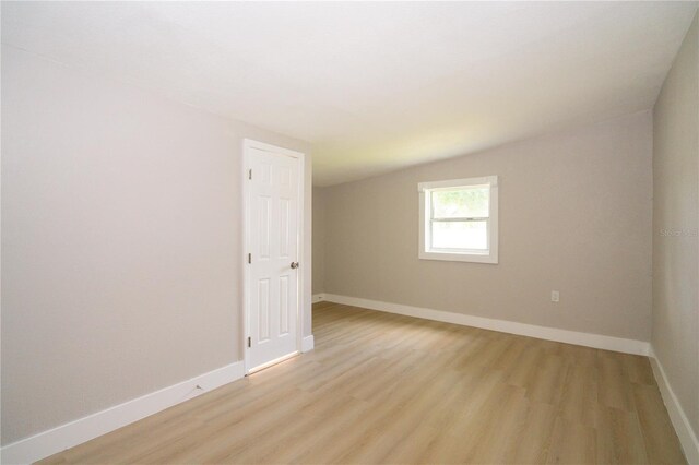 8502 Grapefruit Ave, Tampa, FL 33619 - spare room featuring light wood-type flooring and baseboards