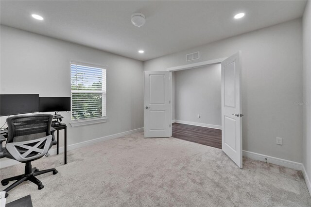 6658 Devlin Ln, Wesley Chapel, FL 33545 - home office featuring carpet flooring, baseboards, and recessed lighting