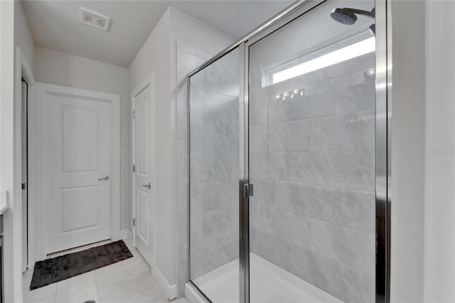 6658 Devlin Ln, Wesley Chapel, FL 33545 - bathroom with a stall shower and tile patterned flooring