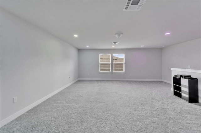 6658 Devlin Ln, Wesley Chapel, FL 33545 - unfurnished living room with carpet floors, recessed lighting, and baseboards