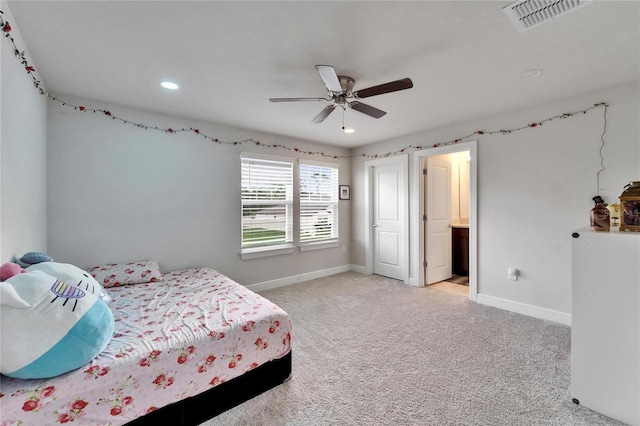 6658 Devlin Ln, Wesley Chapel, FL 33545 - bedroom featuring baseboards, light colored carpet, recessed lighting, ceiling fan, and ensuite bathroom