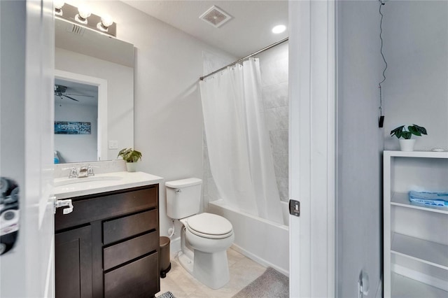 6658 Devlin Ln, Wesley Chapel, FL 33545 - full bath featuring vanity, toilet, shower / tub combo with curtain, a ceiling fan, and tile patterned flooring