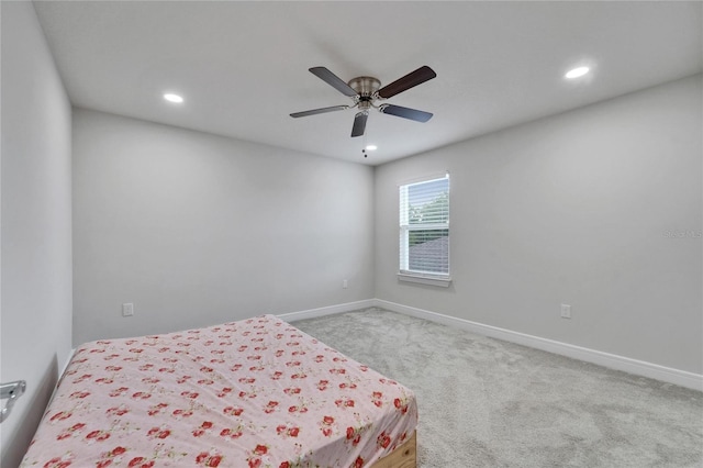 6658 Devlin Ln, Wesley Chapel, FL 33545 - bedroom with carpet, recessed lighting, baseboards, and ceiling fan
