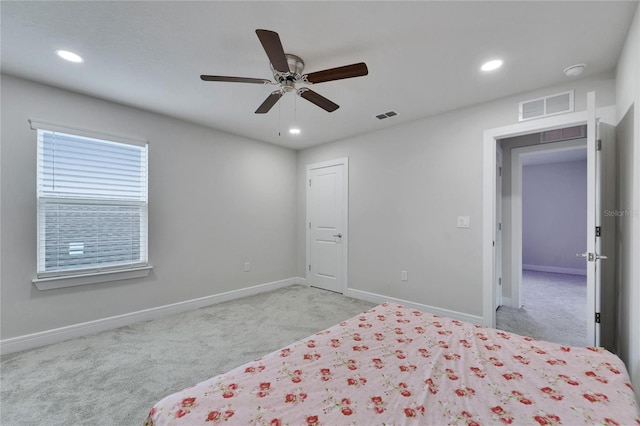 6658 Devlin Ln, Wesley Chapel, FL 33545 - unfurnished bedroom with carpet, baseboards, recessed lighting, and a ceiling fan