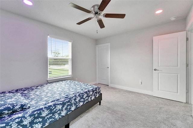 6658 Devlin Ln, Wesley Chapel, FL 33545 - bedroom with carpet flooring, recessed lighting, baseboards, and ceiling fan