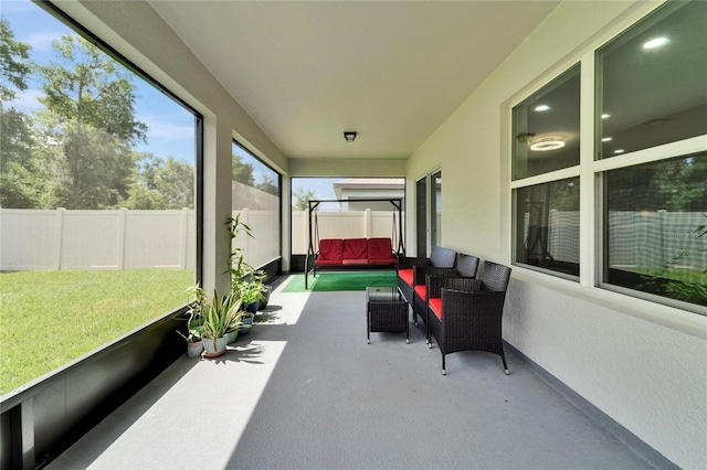 6658 Devlin Ln, Wesley Chapel, FL 33545 - sunroom featuring an outdoor living space