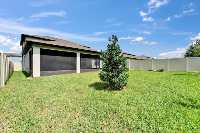 6658 Devlin Ln, Wesley Chapel, FL 33545 - rear view of house featuring a sunroom