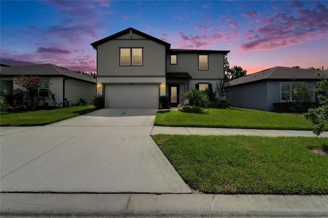 6658 Devlin Ln, Wesley Chapel, FL 33545 - view of front of house with a garage, driveway, and a lawn