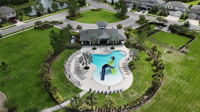 6658 Devlin Ln, Wesley Chapel, FL 33545 - drone / aerial view of a pool area and a nearby body of water
