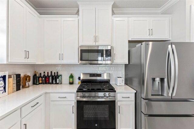 16126 San Donato Pl, Bradenton, FL 34211 - kitchen with stainless steel appliances, white cabinets, ornamental molding, and light countertops