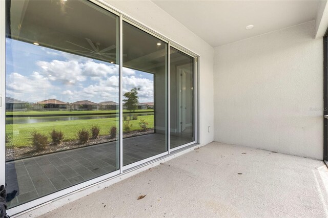 16126 San Donato Pl, Bradenton, FL 34211 - unfurnished sunroom featuring a water view