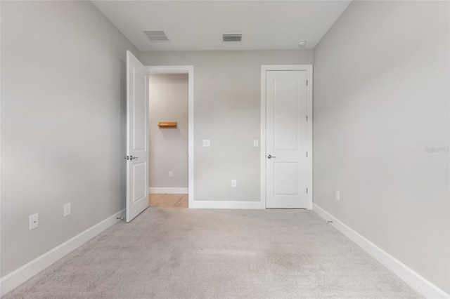 16126 San Donato Pl, Bradenton, FL 34211 - unfurnished bedroom featuring carpet floors and baseboards