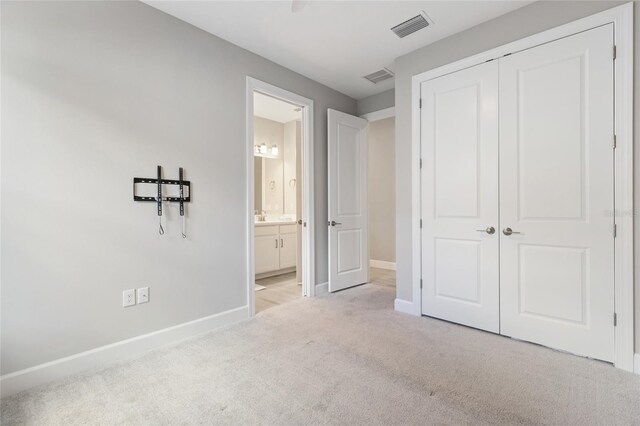 16126 San Donato Pl, Bradenton, FL 34211 - unfurnished bedroom featuring carpet, a closet, and connected bathroom