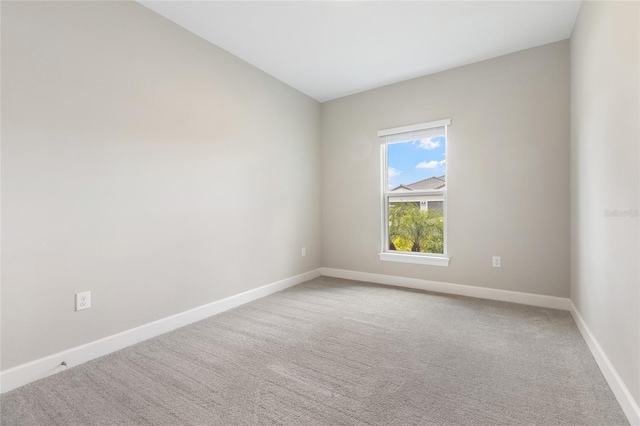 16126 San Donato Pl, Bradenton, FL 34211 - spare room with baseboards and light carpet