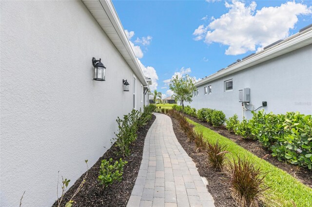 16126 San Donato Pl, Bradenton, FL 34211 - view of side of property featuring stucco siding