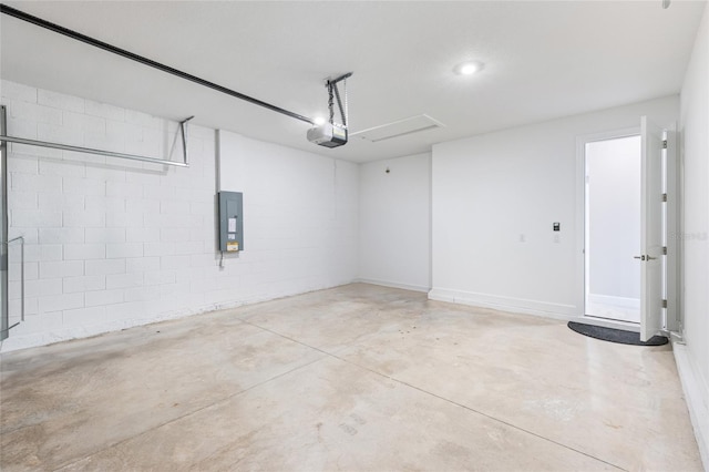16126 San Donato Pl, Bradenton, FL 34211 - garage with electric panel, a garage door opener, and concrete block wall