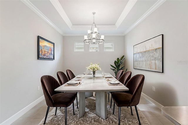 16126 San Donato Pl, Bradenton, FL 34211 - dining room featuring a chandelier, light tile patterned floors, ornamental molding, and a tray ceiling