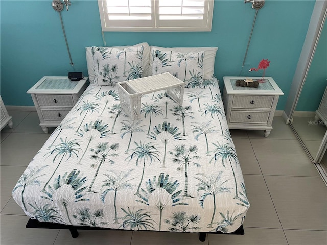 800 Bayway Blvd Unit 14, Clearwater Beach, FL 33767 - bedroom featuring tile patterned flooring