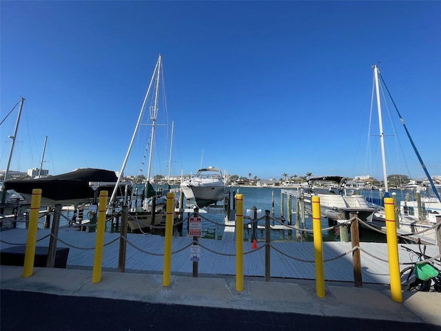 800 Bayway Blvd Unit 14, Clearwater Beach, FL 33767 - dock with a water view and boat lift