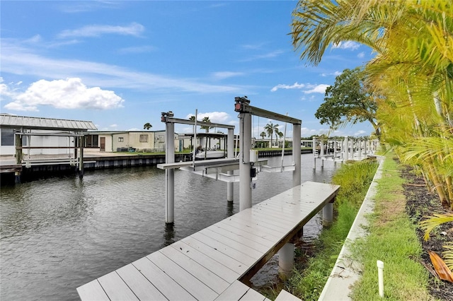 6528 Simone Shores Cir, Apollo Beach, FL 33572 - dock area with boat lift and a water view