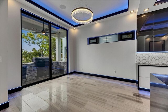 6528 Simone Shores Cir, Apollo Beach, FL 33572 - unfurnished room featuring baseboards, ceiling fan, and light tile patterned floors