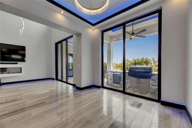 6528 Simone Shores Cir, Apollo Beach, FL 33572 - spare room featuring baseboards and a ceiling fan