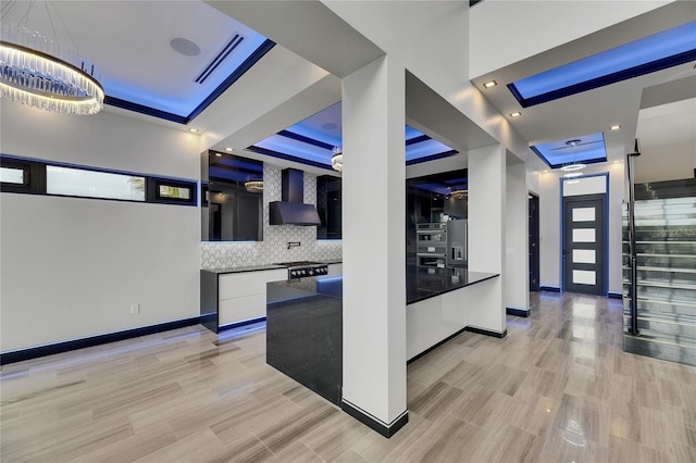 6528 Simone Shores Cir, Apollo Beach, FL 33572 - hallway featuring baseboards, a chandelier, and recessed lighting