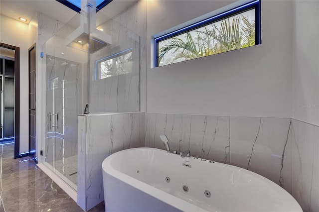 6528 Simone Shores Cir, Apollo Beach, FL 33572 - bathroom featuring a freestanding bath, a shower stall, and marble tiled floors