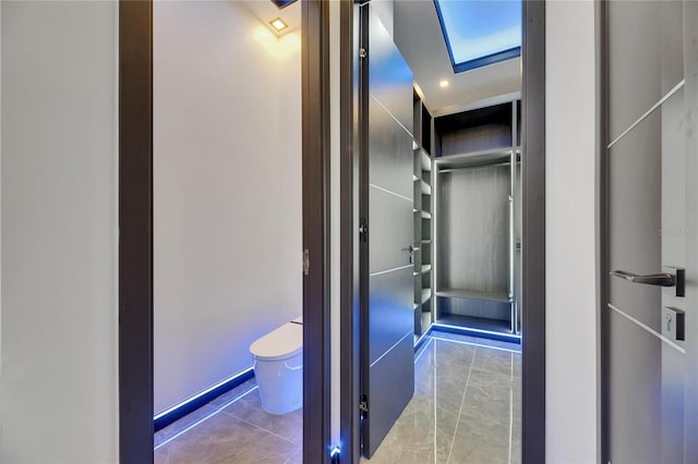 6528 Simone Shores Cir, Apollo Beach, FL 33572 - hall featuring a skylight and marble finish flooring