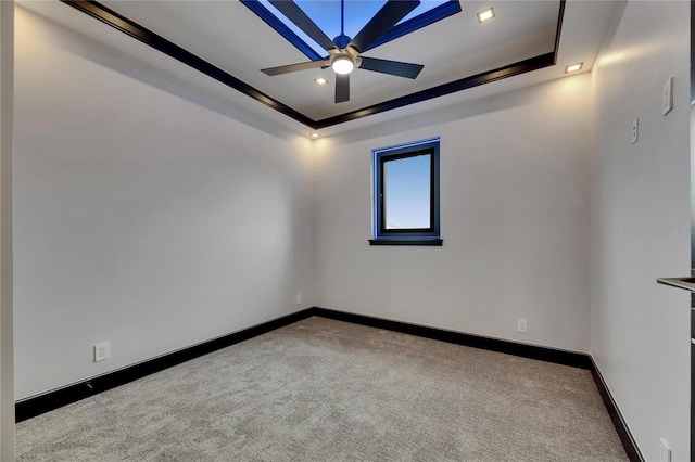 6528 Simone Shores Cir, Apollo Beach, FL 33572 - carpeted empty room with ceiling fan, a tray ceiling, and baseboards