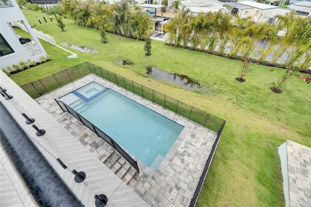 6528 Simone Shores Cir, Apollo Beach, FL 33572 - view of pool featuring a pool with connected hot tub and a residential view