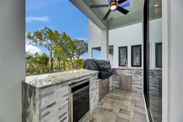 6528 Simone Shores Cir, Apollo Beach, FL 33572 - view of patio with wine cooler and ceiling fan