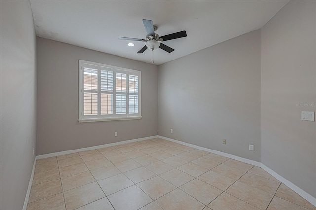 20109 Bay Cedar Ave, Tampa, FL 33647 - unfurnished room featuring a ceiling fan, light tile patterned flooring, and baseboards