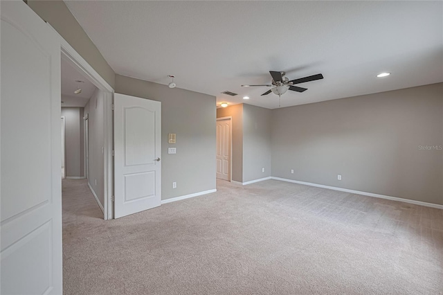 20109 Bay Cedar Ave, Tampa, FL 33647 - empty room with light carpet, a ceiling fan, baseboards, and recessed lighting