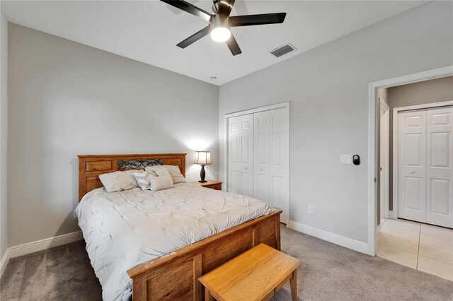6127 Colmar Pl, Apollo Beach, FL 33572 - bedroom with light carpet, baseboards, a closet, and ceiling fan