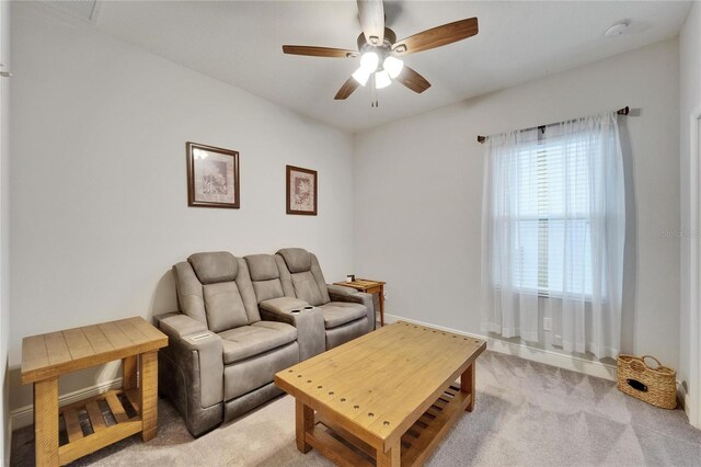 6127 Colmar Pl, Apollo Beach, FL 33572 - living room featuring a ceiling fan, light carpet, and baseboards