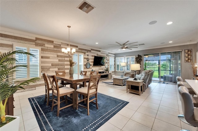 6127 Colmar Pl, Apollo Beach, FL 33572 - dining space with a chandelier, light tile patterned flooring, a ceiling fan, recessed lighting, and ornamental molding