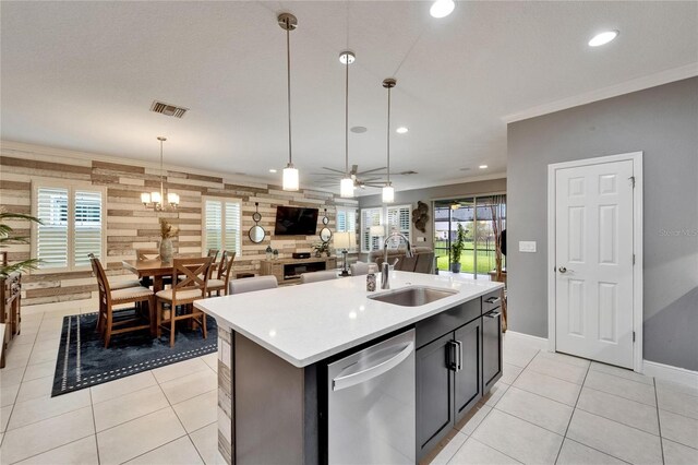 6127 Colmar Pl, Apollo Beach, FL 33572 - kitchen featuring dishwasher, a sink, light countertops, recessed lighting, and light tile patterned floors