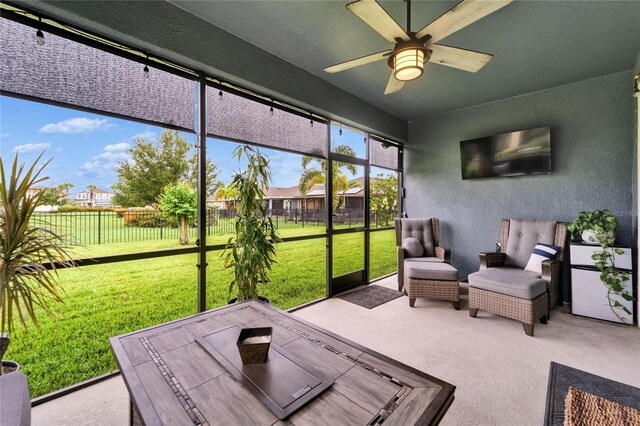 6127 Colmar Pl, Apollo Beach, FL 33572 - sunroom / solarium featuring a ceiling fan