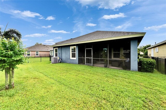 6127 Colmar Pl, Apollo Beach, FL 33572 - back of property with a sunroom, cooling unit, and stucco siding