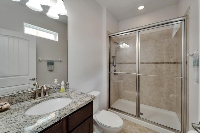 449 Bahama Grande Blvd, Apollo Beach, FL 33572 - bathroom featuring toilet, a stall shower, and vanity