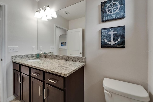 449 Bahama Grande Blvd, Apollo Beach, FL 33572 - bathroom featuring vanity and toilet