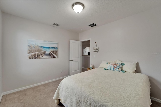 449 Bahama Grande Blvd, Apollo Beach, FL 33572 - carpeted bedroom featuring baseboards and a textured ceiling