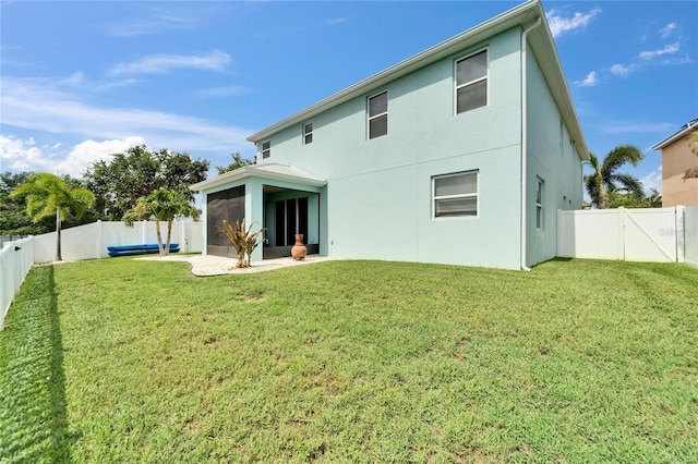 449 Bahama Grande Blvd, Apollo Beach, FL 33572 - rear view of property featuring a sunroom and stucco siding