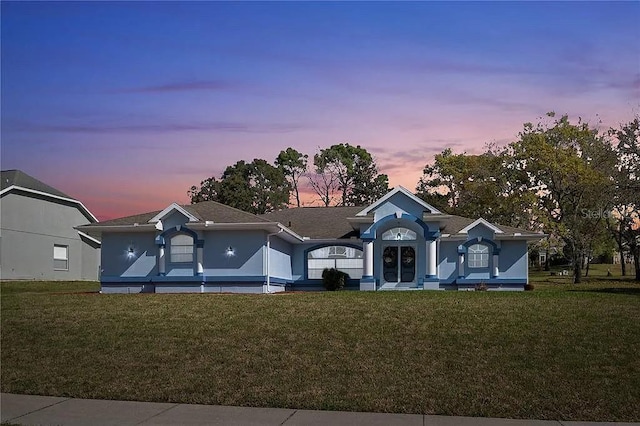 13377 Elise Ln, Spring Hill, FL 34609 - single story home with a front yard and stucco siding