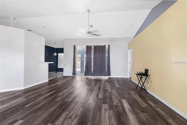 13377 Elise Ln, Spring Hill, FL 34609 - unfurnished living room with wood finished floors, ceiling fan, baseboards, and high vaulted ceiling