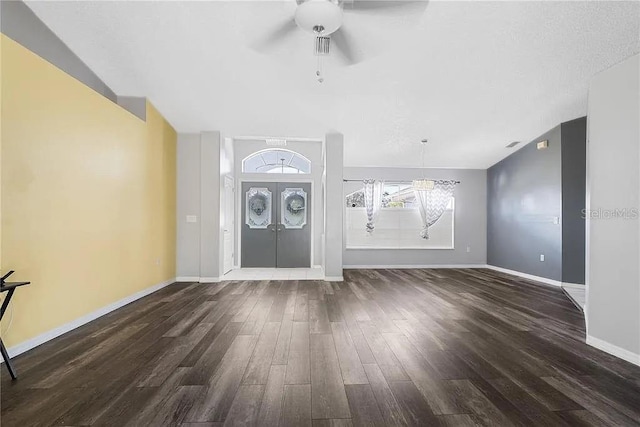 13377 Elise Ln, Spring Hill, FL 34609 - foyer entrance with wood finished floors, a ceiling fan, and baseboards