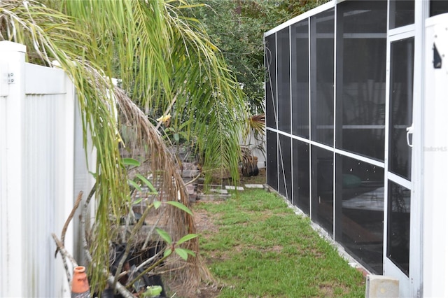 2470 Del Rio Way, Dunedin, FL 34698 - view of yard with a sunroom