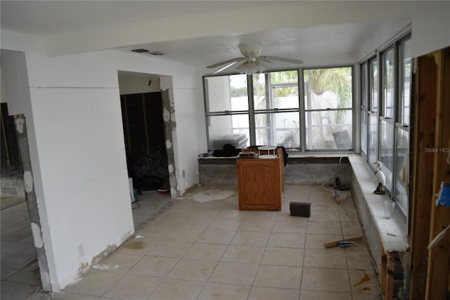 2470 Del Rio Way, Dunedin, FL 34698 - sunroom featuring ceiling fan and tile patterned floors