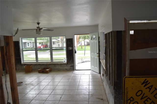 2470 Del Rio Way, Dunedin, FL 34698 - entrance foyer with ceiling fan and light tile patterned flooring
